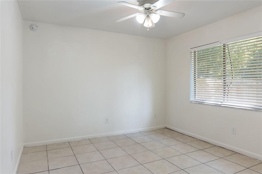 1031 Southwest 61st Street Gainesville, FL 32607 - Photo 11 of 17 an empty room with a window