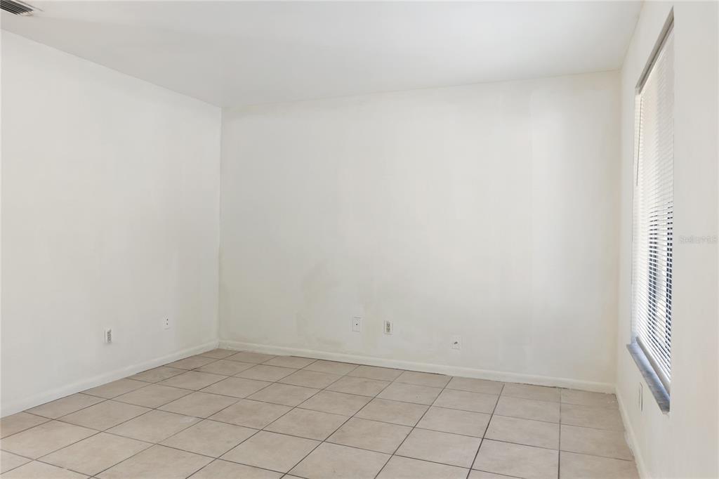 1031 Southwest 61st Street Gainesville, FL 32607 - Photo 2 of 17 a view of an empty room