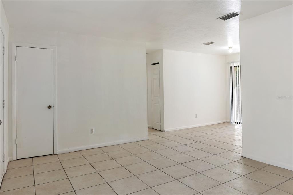 1031 Southwest 61st Street Gainesville, FL 32607 - Photo 3 of 17 a view of an empty room and closet area