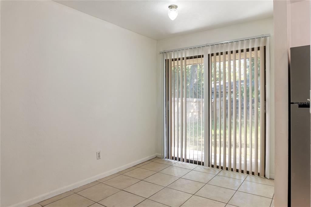 1031 Southwest 61st Street Gainesville, FL 32607 - Photo 5 of 17 a view of a room with windows