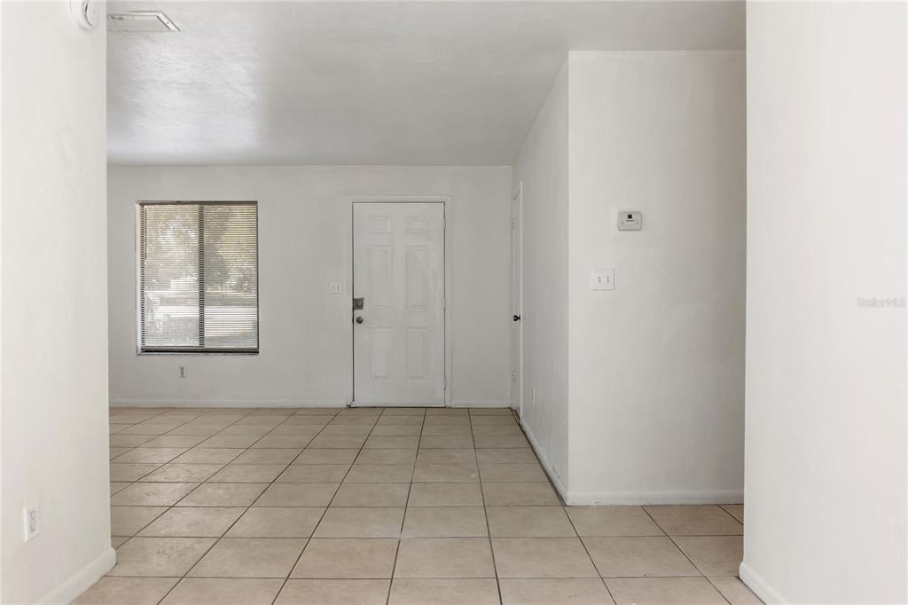 1031 Southwest 61st Street Gainesville, FL 32607 - Photo 6 of 17 a view of an empty room with window
