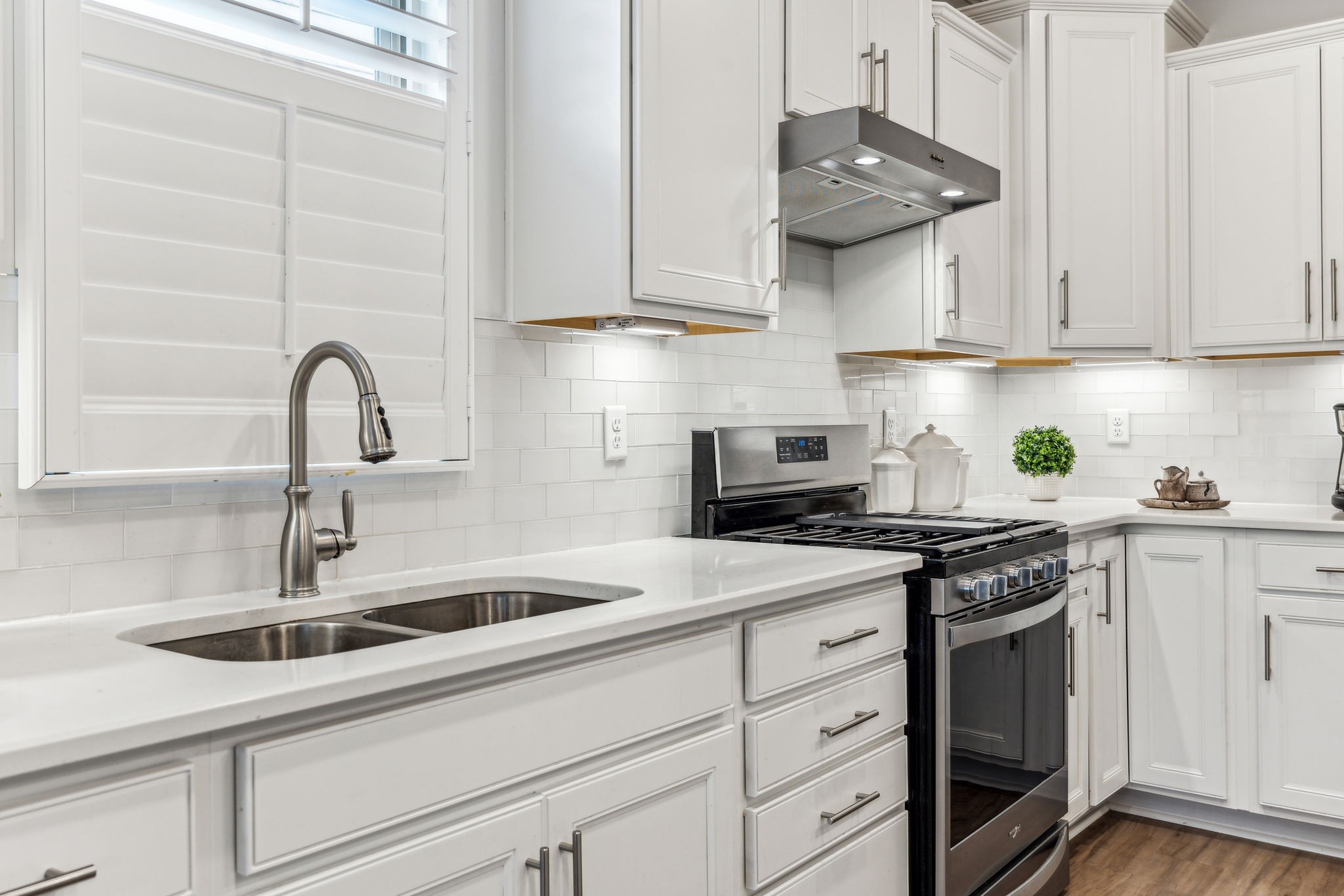 1062 Sumner Grove Spring Hill, TN 37174 - Photo 12 of 44 a kitchen with stainless steel appliances granite countertop a sink and a stove