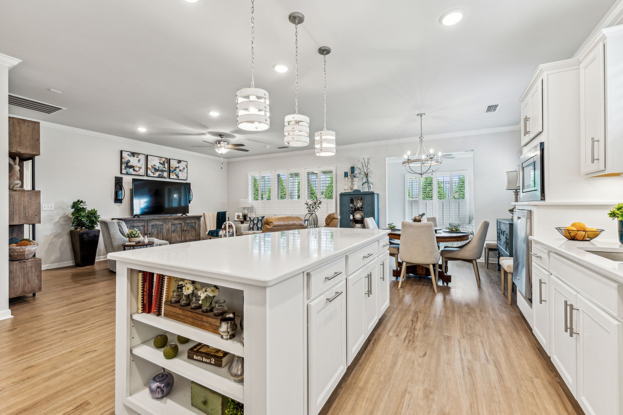 1062 Sumner Grove Spring Hill, TN 37174 - Photo 13 of 44 a large white kitchen with living room and living room view