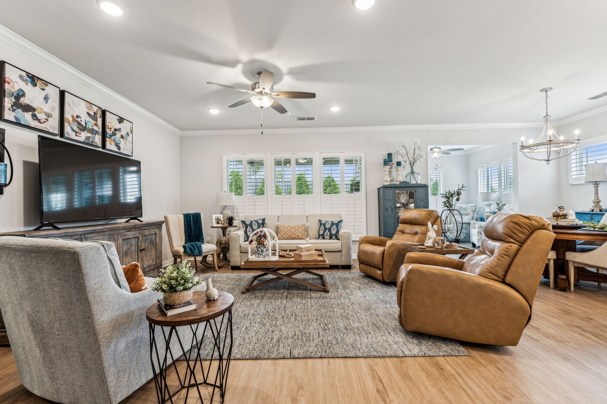 1062 Sumner Grove Spring Hill, TN 37174 - Photo 14 of 44 a living room with furniture a flat screen tv and kitchen view
