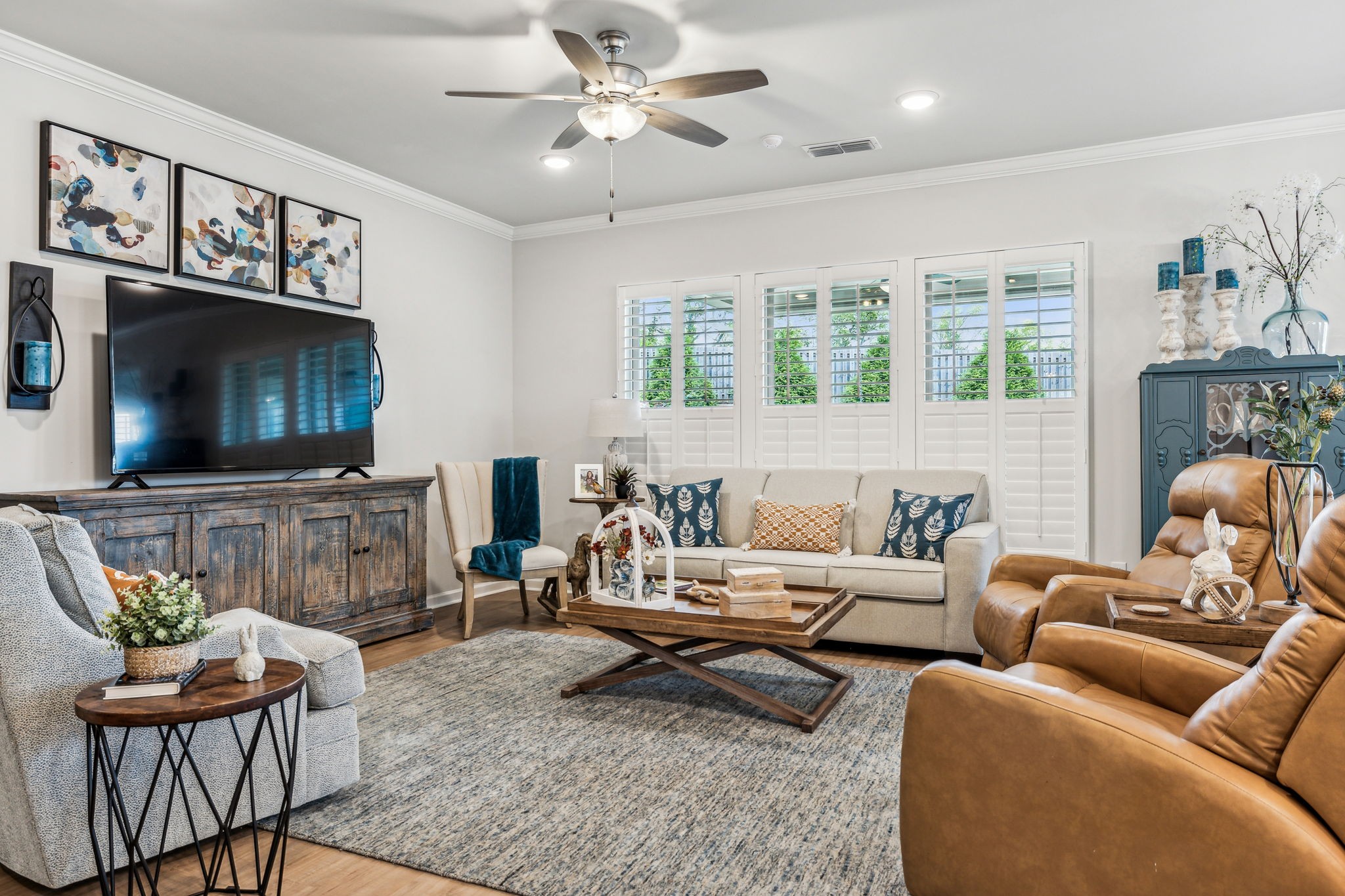1062 Sumner Grove Spring Hill, TN 37174 - Photo 15 of 44 a living room with furniture a flat screen tv and a fireplace