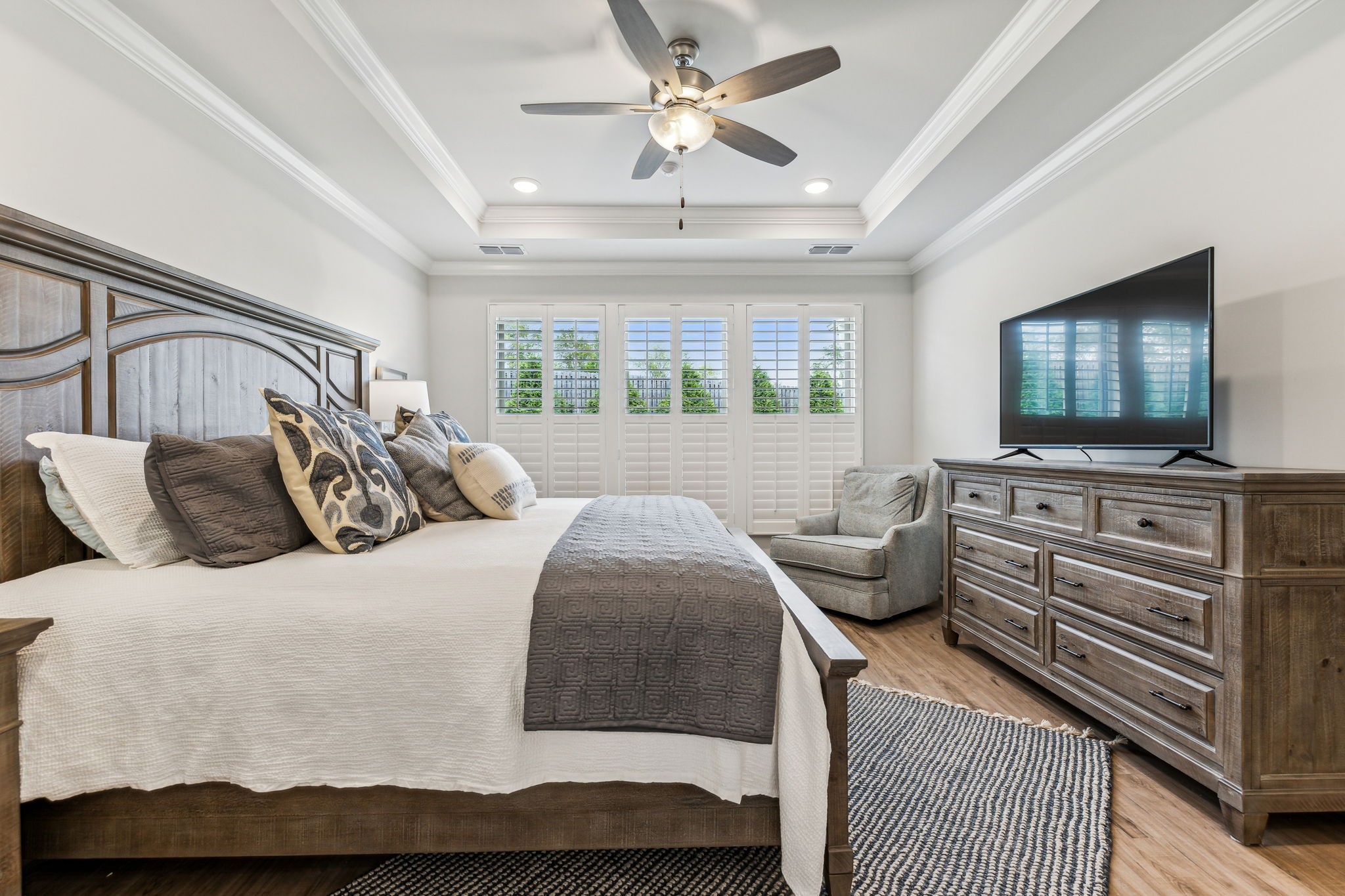 1062 Sumner Grove Spring Hill, TN 37174 - Photo 23 of 44 a bedroom with a bed and flat screen tv