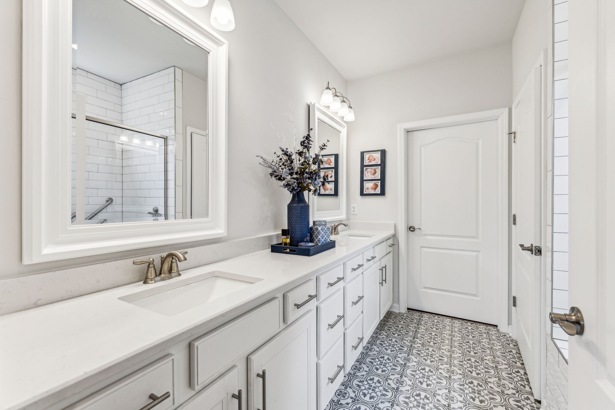 1062 Sumner Grove Spring Hill, TN 37174 - Photo 24 of 44 a bathroom with a sink and a mirror