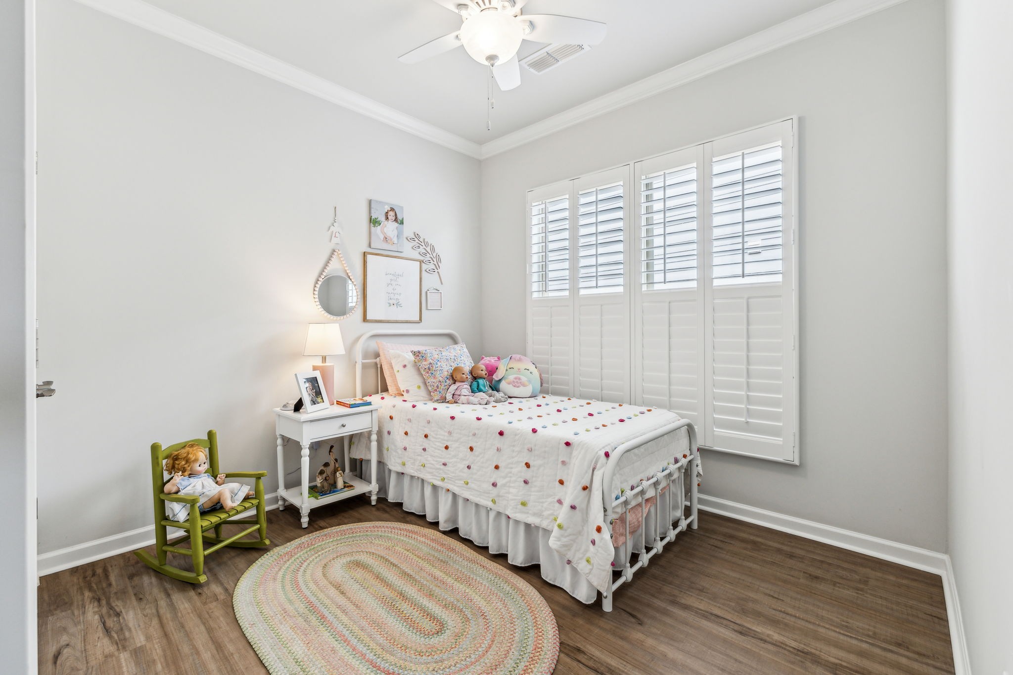 1062 Sumner Grove Spring Hill, TN 37174 - Photo 29 of 44 a bedroom with a bed and a chandelier