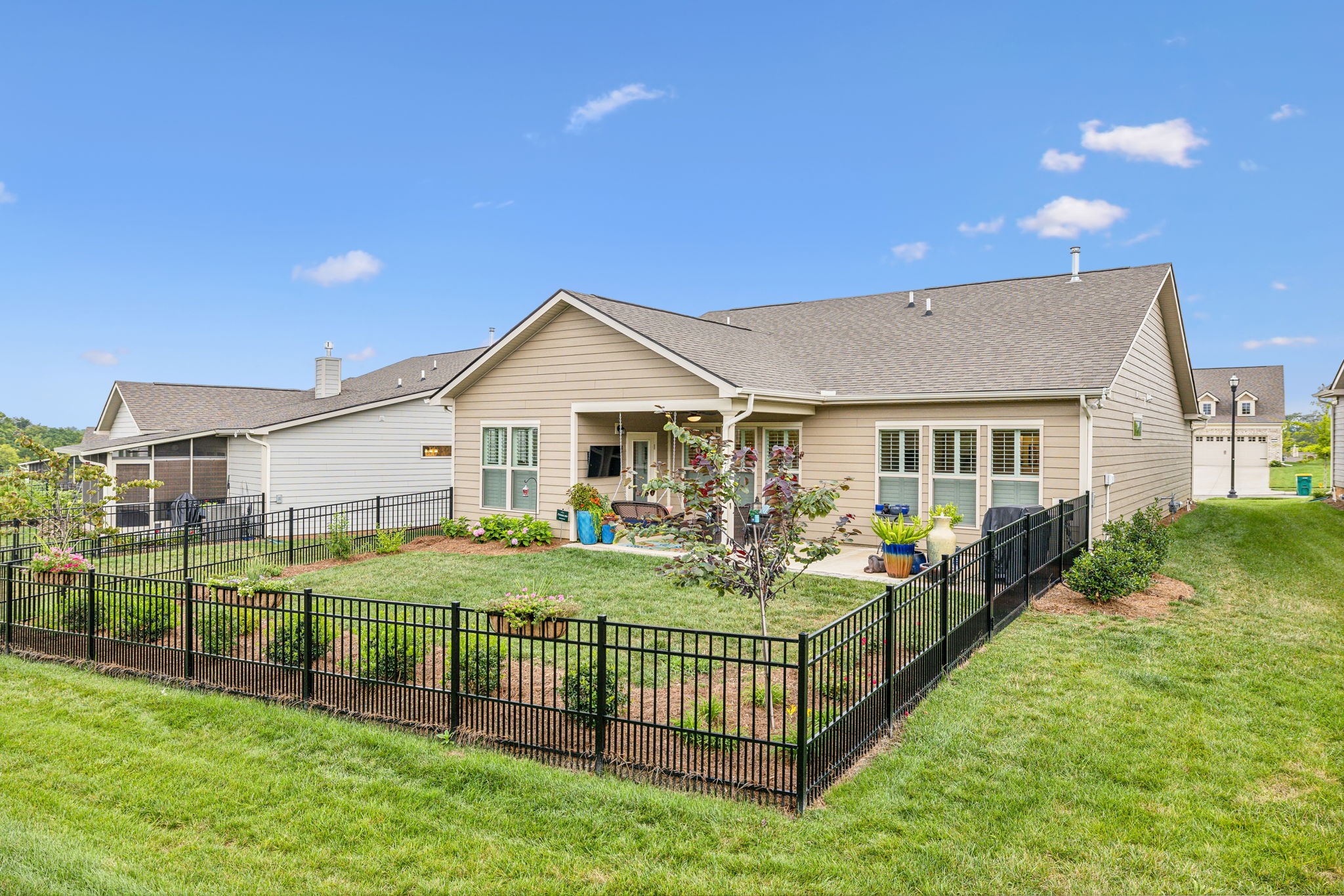 1062 Sumner Grove Spring Hill, TN 37174 - Photo 37 of 44 a view of a house with backyard and porch
