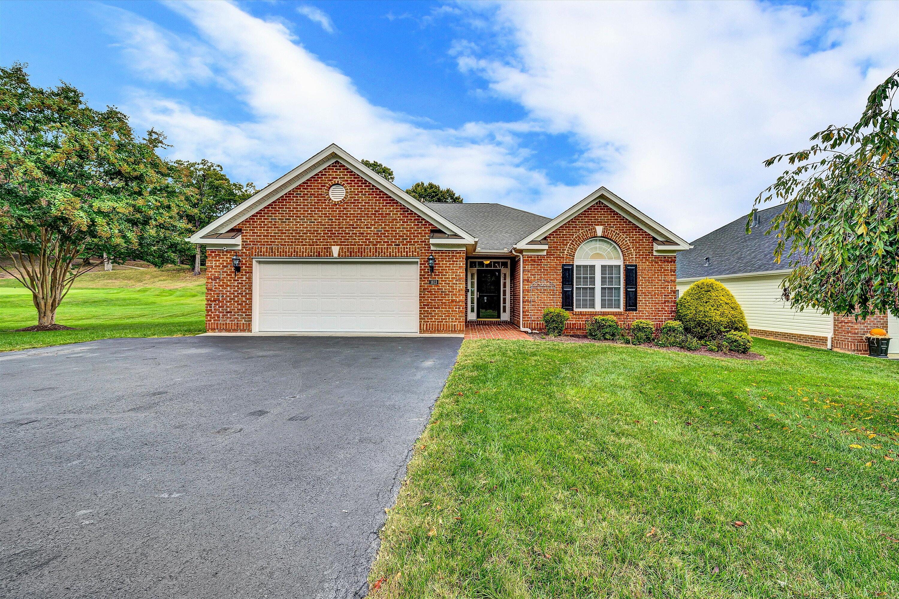 1613 Edgebrook Road Salem, VA 24153 - Photo 1 of 40 a front view of a house with a yard and garage