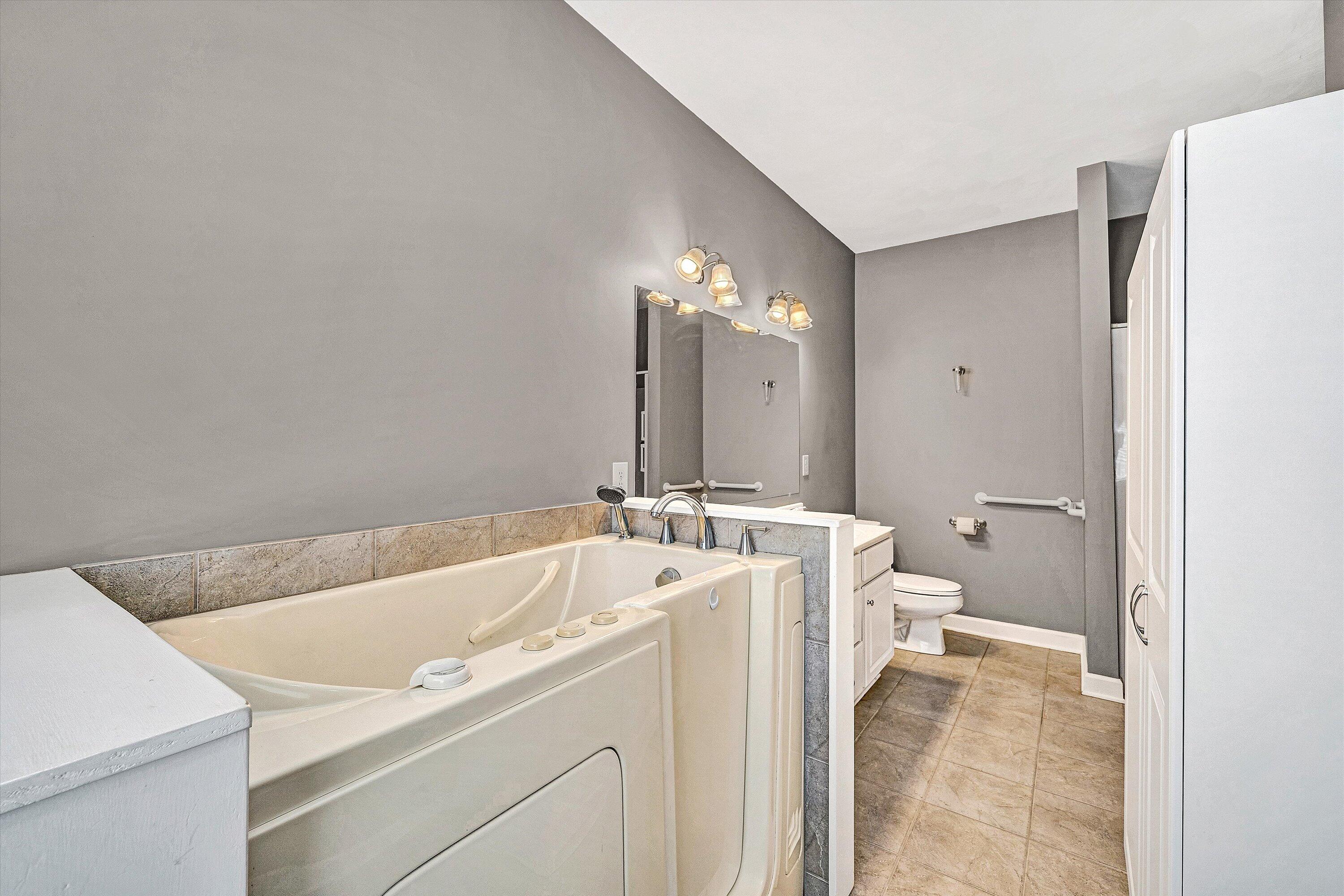 1613 Edgebrook Road Salem, VA 24153 - Photo 25 of 40 a bathroom with a sink a toilet and a large mirror