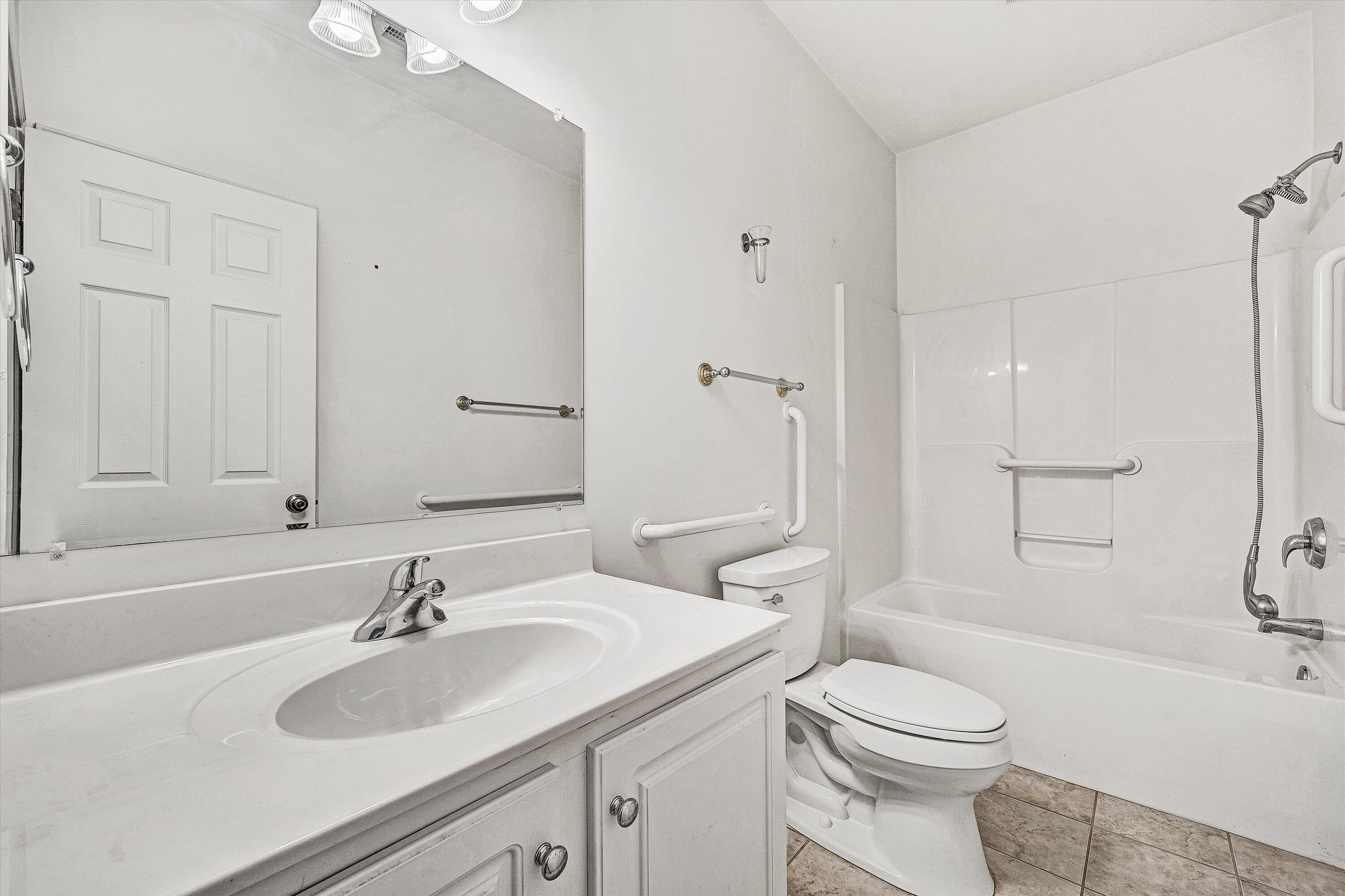 1613 Edgebrook Road Salem, VA 24153 - Photo 29 of 40 a bathroom with a sink toilet a tub and shower