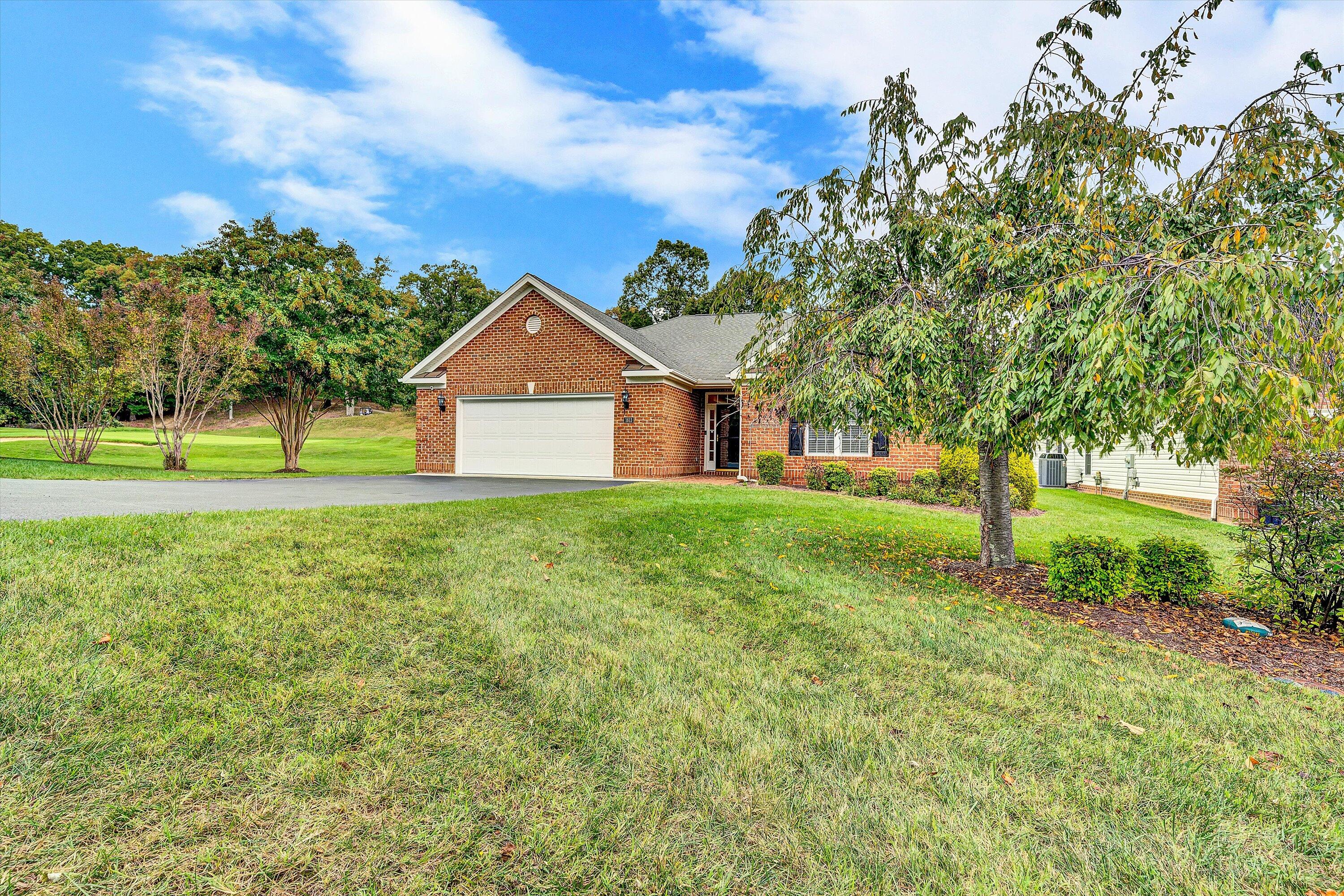 1613 Edgebrook Road Salem, VA 24153 - Photo 39 of 40 a house with huge green field in front of it
