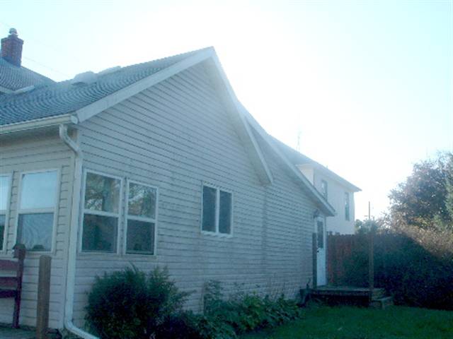 12204 West Haldane Road Forreston, IL 61030 - Photo 8 of 9 a view of a house with backyard