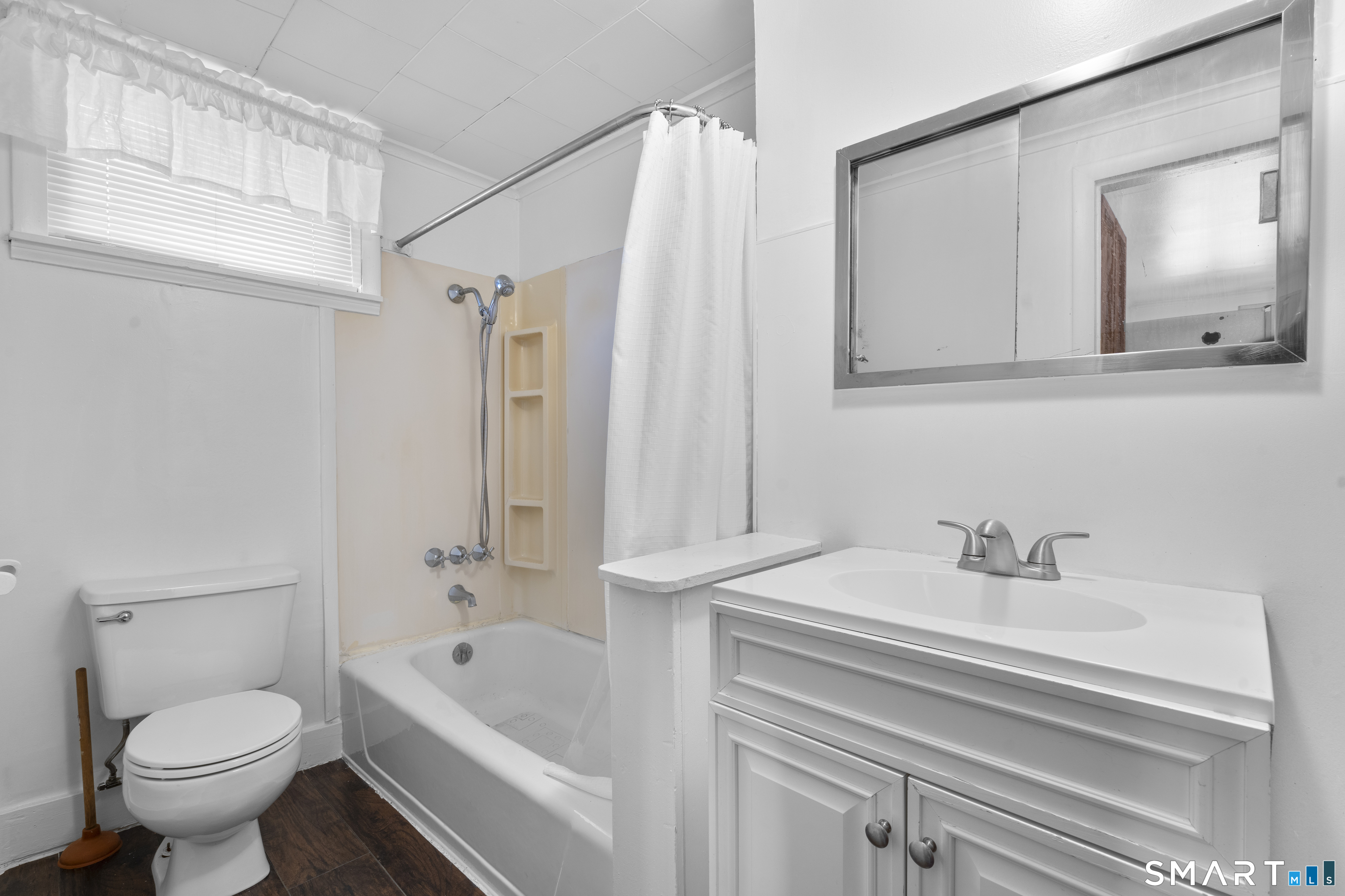 48 Anderson Street, Unit 2 Naugatuck, CT 06770 - Photo 6 of 7 a bathroom with a sink a toilet and a bathtub