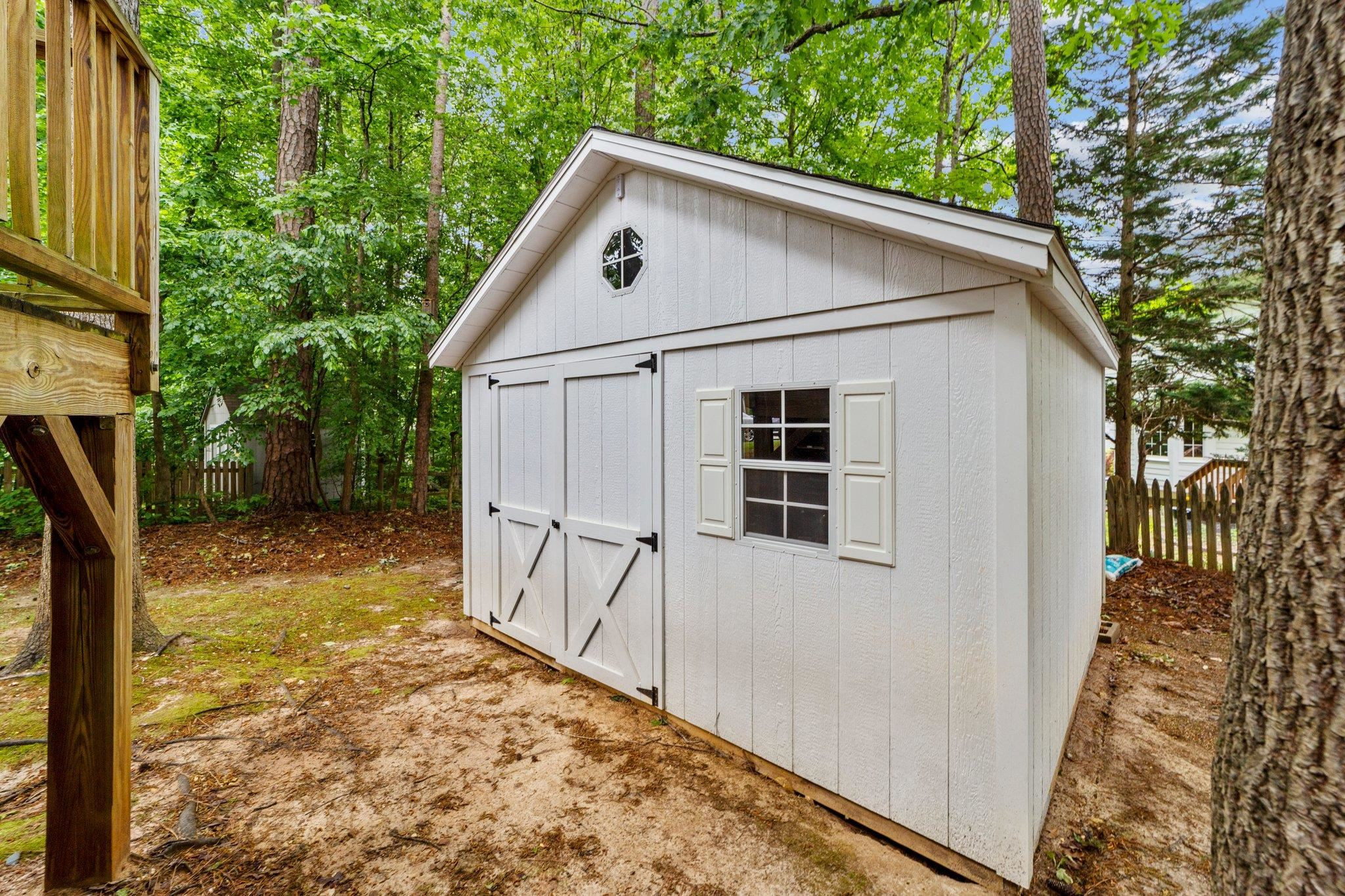 12205 Harcourt Drive Raleigh, NC 27613 - Photo 34 of 35 Oversized shed provides loads of additional storage options!