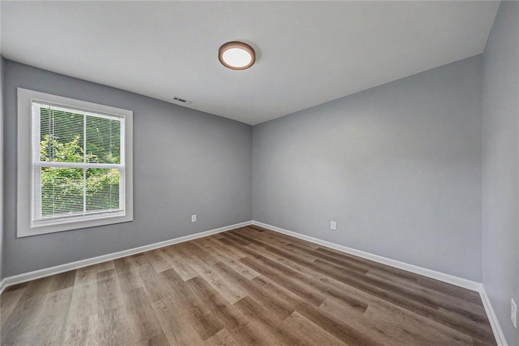 411 Hardy Avenue Southwest Rome, GA 30161 - Photo 21 of 27 an empty room with a window
