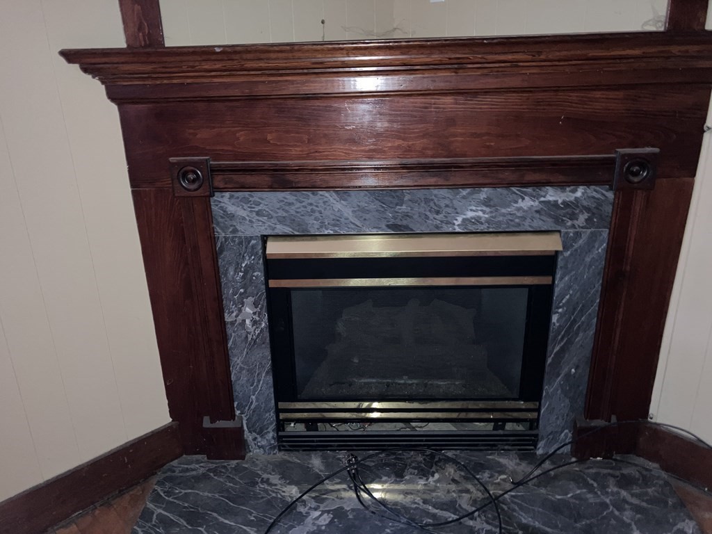 328 Worcester Street Southbridge, MA 01550 - Photo 11 of 26 a stove top oven sitting inside of a kitchen