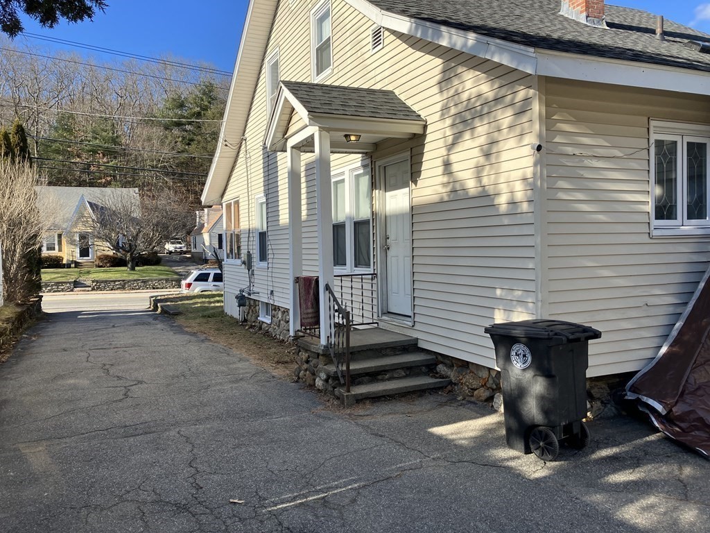 328 Worcester Street Southbridge, MA 01550 - Photo 2 of 26 a view of a patio with table and chairs with wooden floor and fence