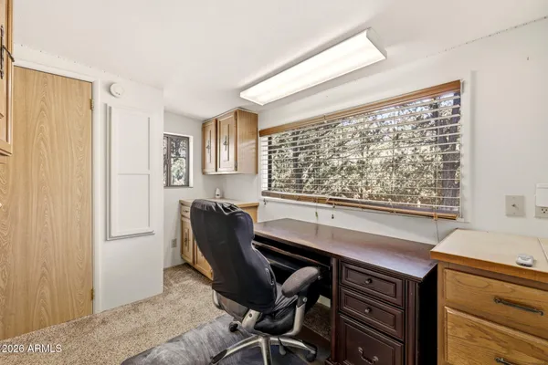 a kitchen with a stove a sink and a microwave