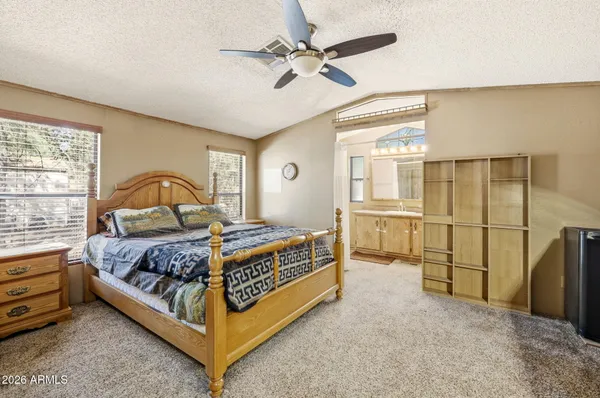 a work room with furniture and a window