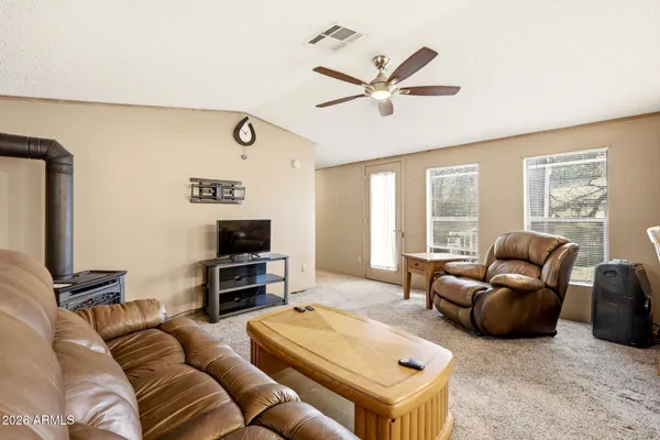 a view of balcony with wooden floor