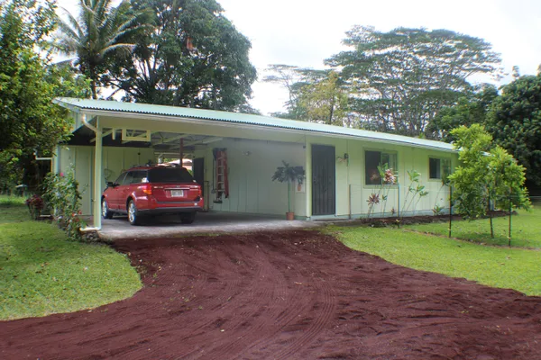 a view of a car in front of house