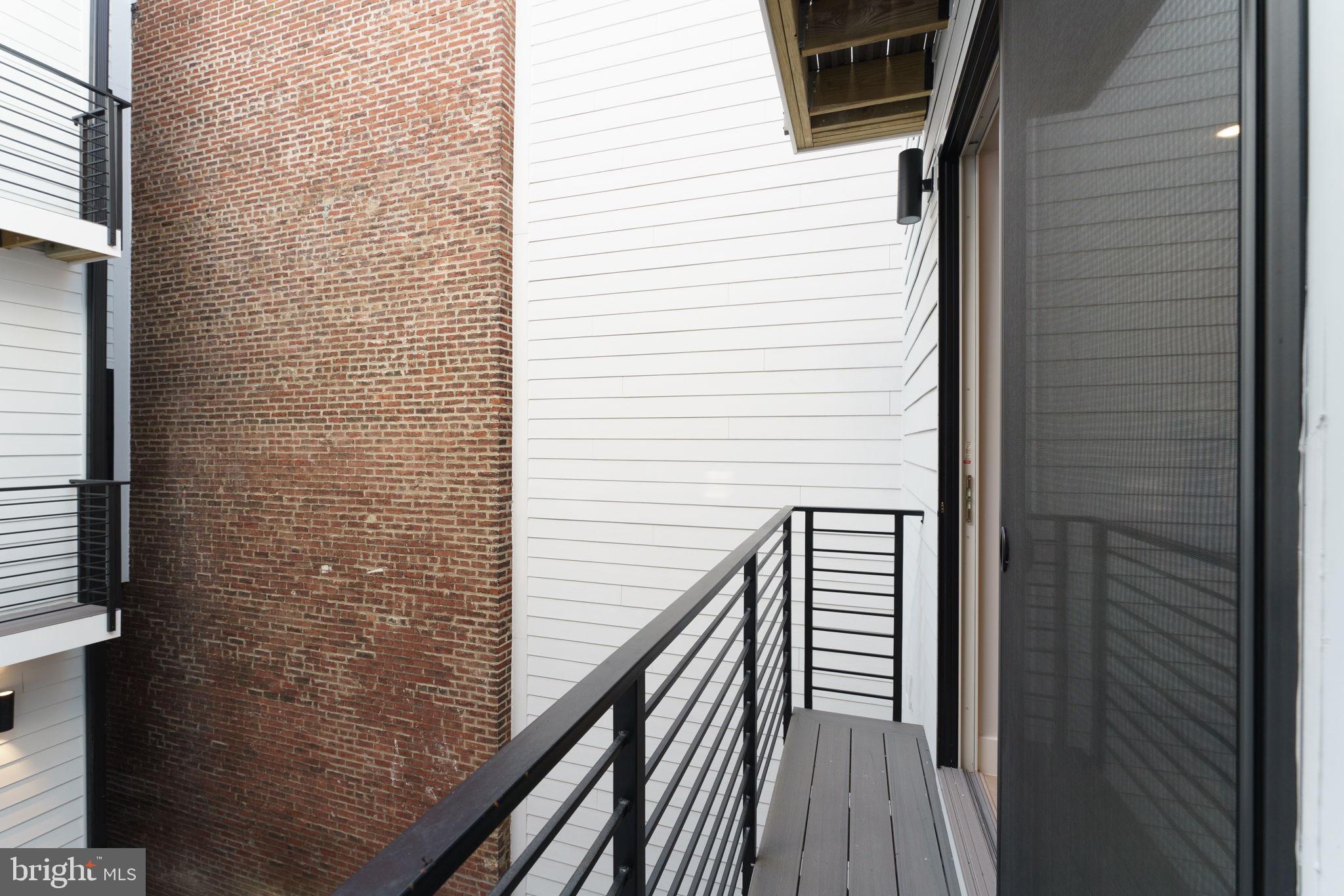 1112 6th Street Northwest, Unit 6 Washington, DC 20001 - Photo 15 of 17 Balcony off living space overlooking the courtyard