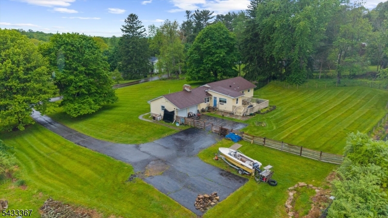 650 Woodglen Road Glen Gardner, NJ 08826 - Photo 2 of 28 an aerial view of a house with a garden
