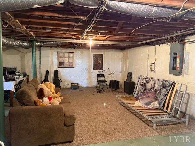 153 Ridge Street Madison Heights, VA 24572 - Photo 25 of 26 a living room with furniture and a chandelier