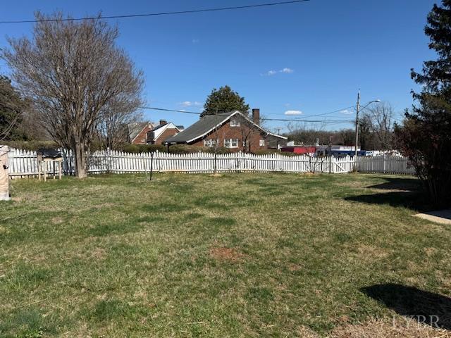 153 Ridge Street Madison Heights, VA 24572 - Photo 6 of 26 a front view of a house with a yard