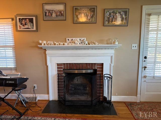 153 Ridge Street Madison Heights, VA 24572 - Photo 10 of 26 a living room with furniture and a fireplace