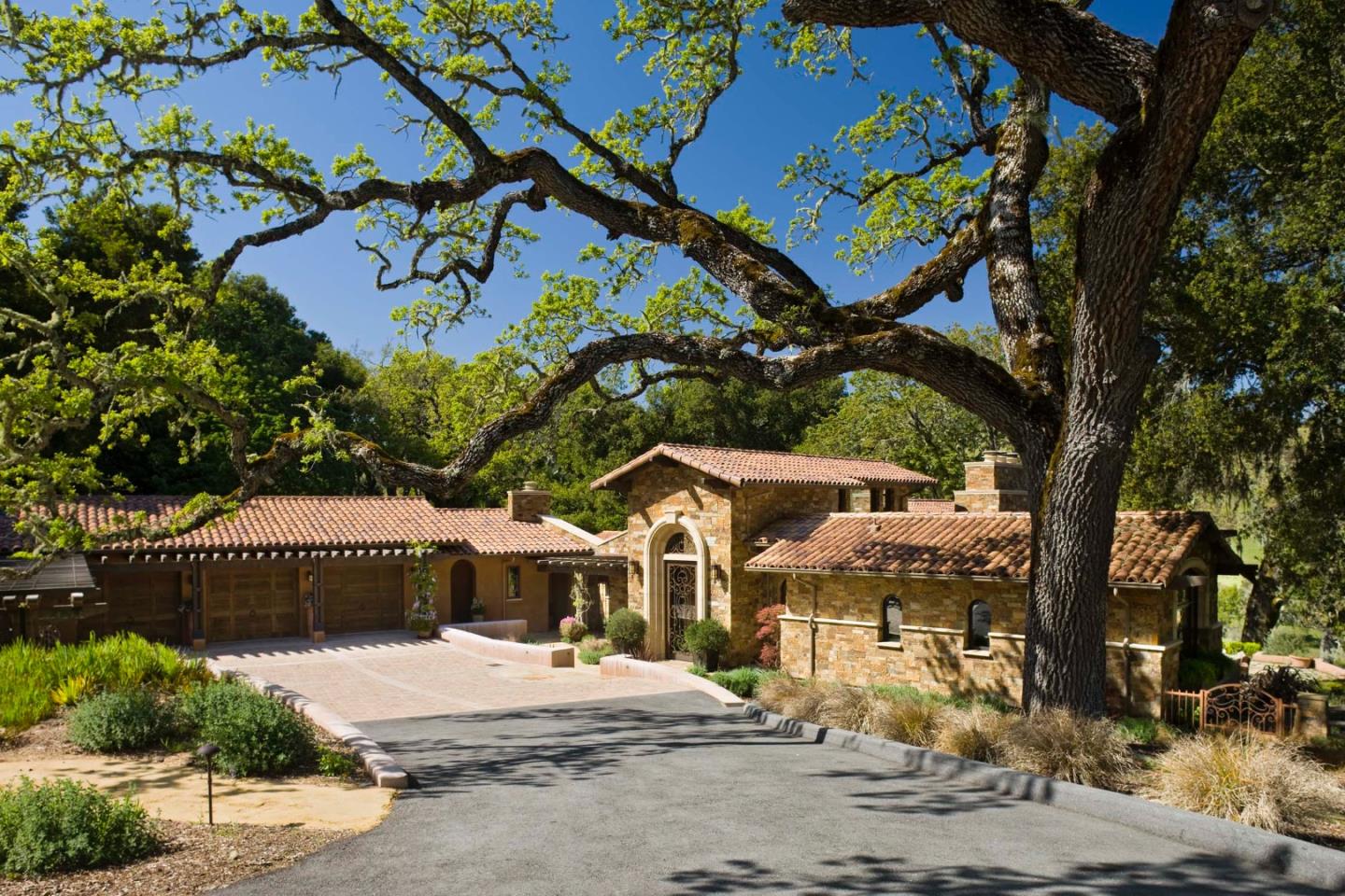 4 Rumsen Trace Carmel, CA 93923 - Photo 1 of 15 a picture of a building with a tree