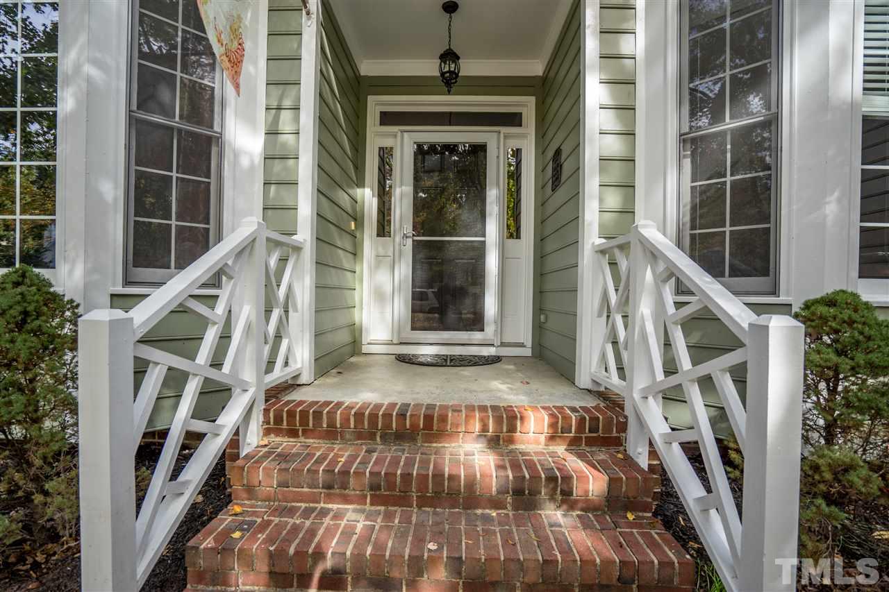 11912 Fairlie Place Raleigh, NC 27613 - Photo 3 of 25 a view of an entryway with staircase