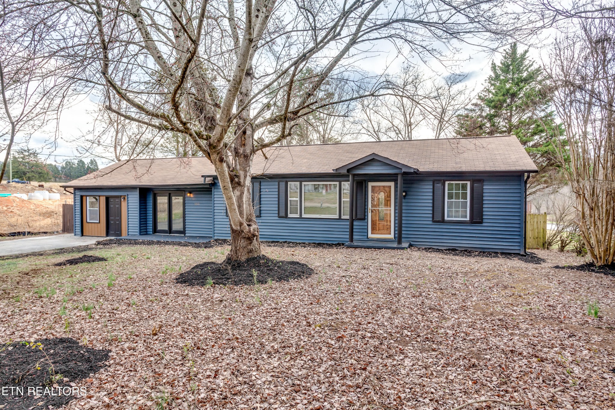 5715 Brown Gap Road Knoxville, TN 37918 - Photo 1 of 37 a front view of a house with a garden