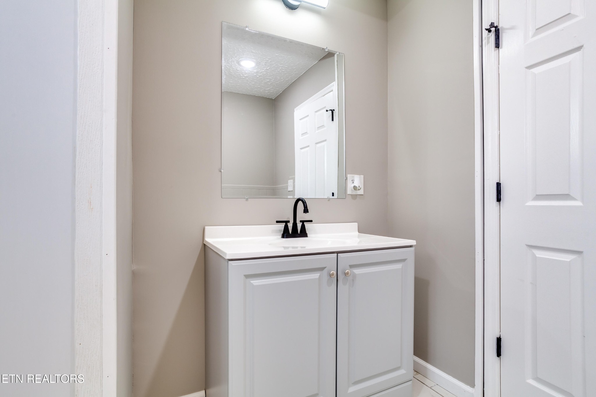 5715 Brown Gap Road Knoxville, TN 37918 - Photo 27 of 37 a view of a sink and a mirror
