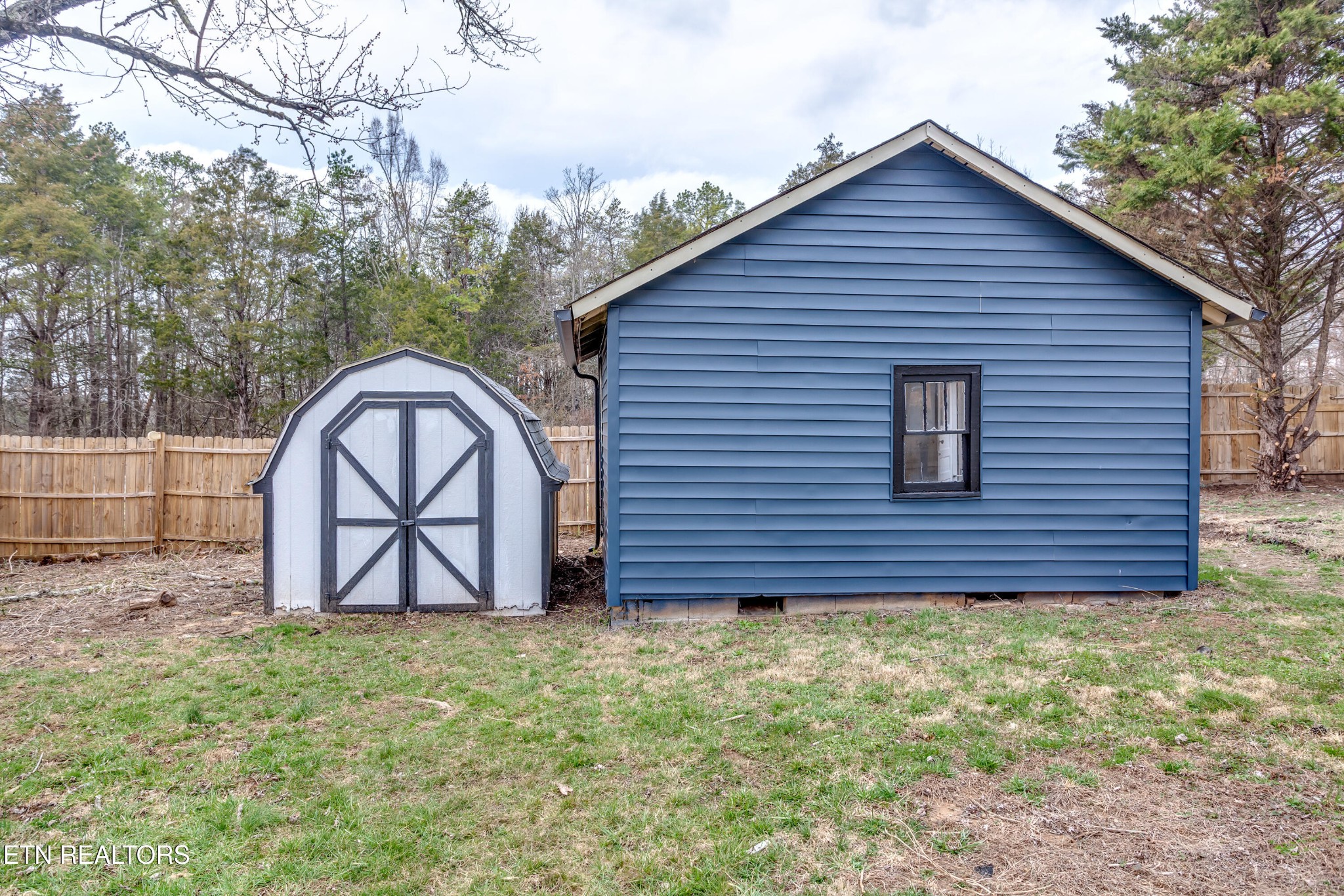 5715 Brown Gap Road Knoxville, TN 37918 - Photo 31 of 37 a view of front of a house with swing and wooden fence