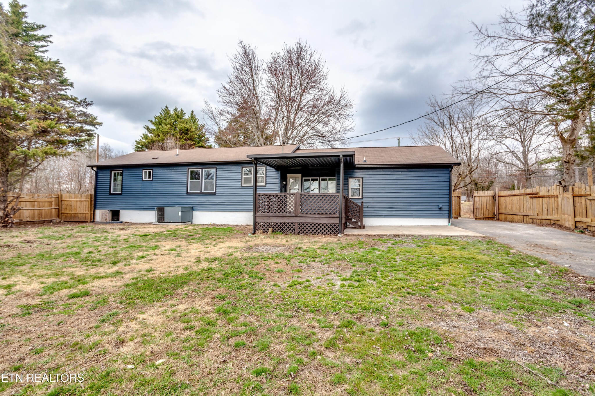 5715 Brown Gap Road Knoxville, TN 37918 - Photo 35 of 37 a front view of a house with a yard and garage