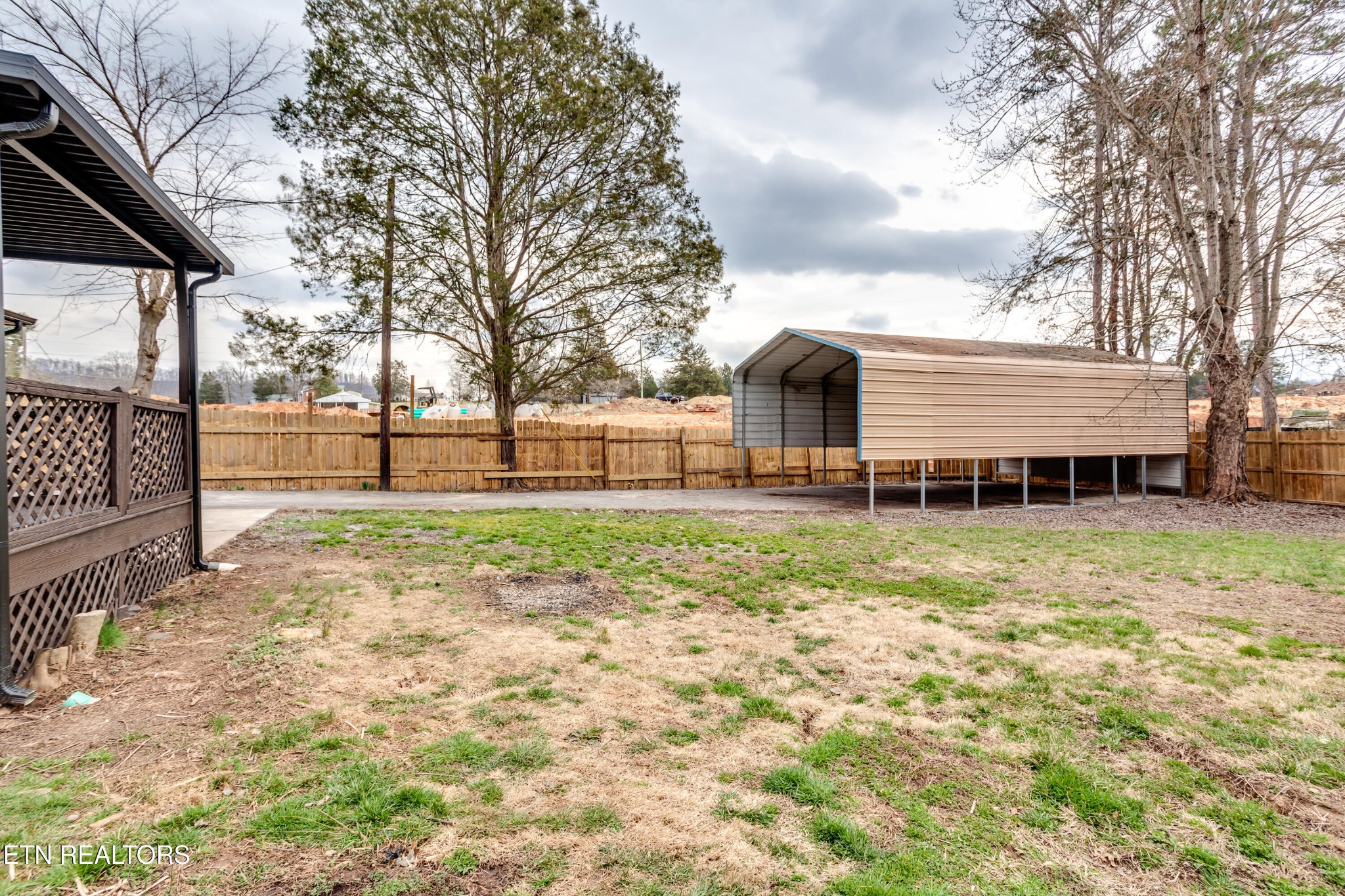 5715 Brown Gap Road Knoxville, TN 37918 - Photo 36 of 37 a view of a house with backyard and trees