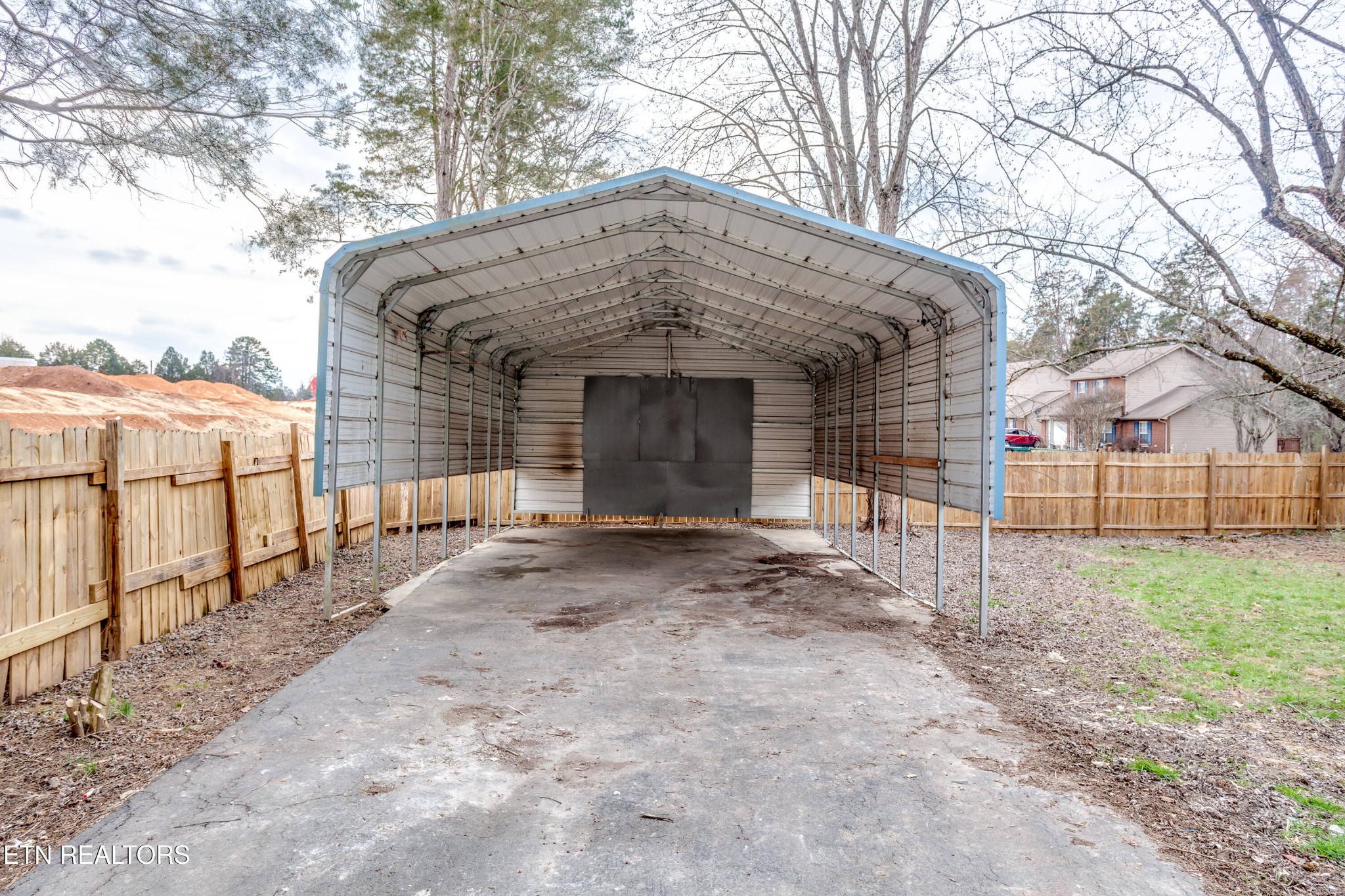 5715 Brown Gap Road Knoxville, TN 37918 - Photo 37 of 37 a front view of a house with a yard and garage