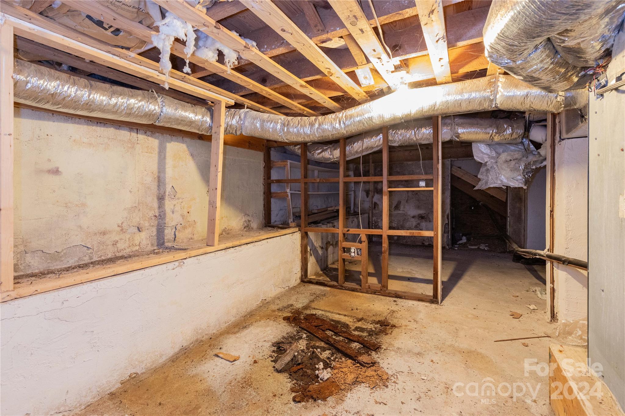 1245 Pine Spring Drive Hendersonville, NC 28739 - Photo 13 of 20 a view of a room with wooden walls and a window