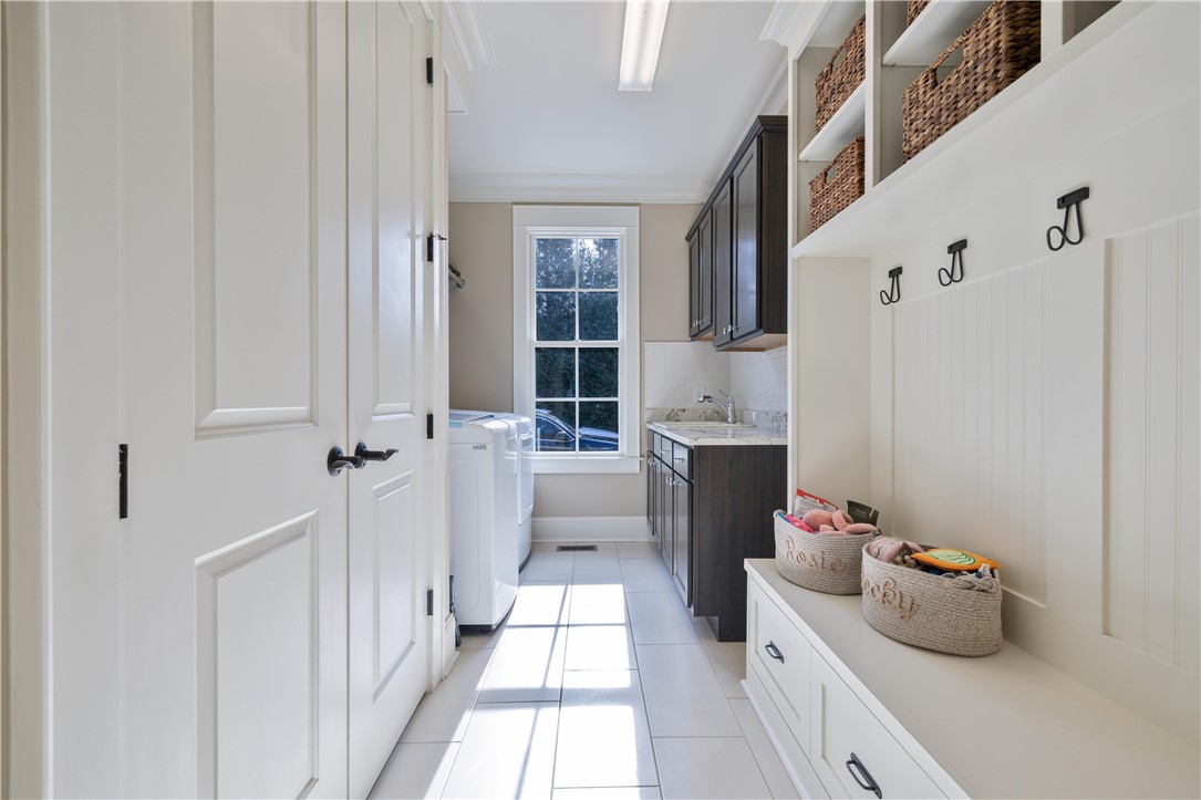 301 Stonebridge Drive Clemson, SC 29631 - Photo 27 of 47 This functional laundry area features ample storage and natural light.