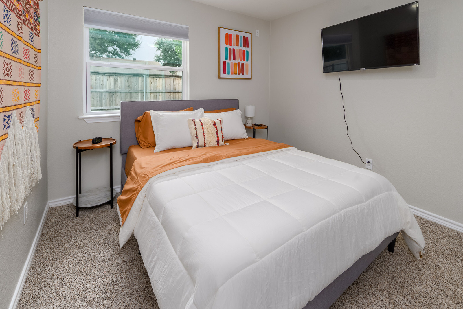 1651 Chippeway Lane Austin, TX 78745 - Photo 22 of 26 a bed sitting in a bedroom next to a window