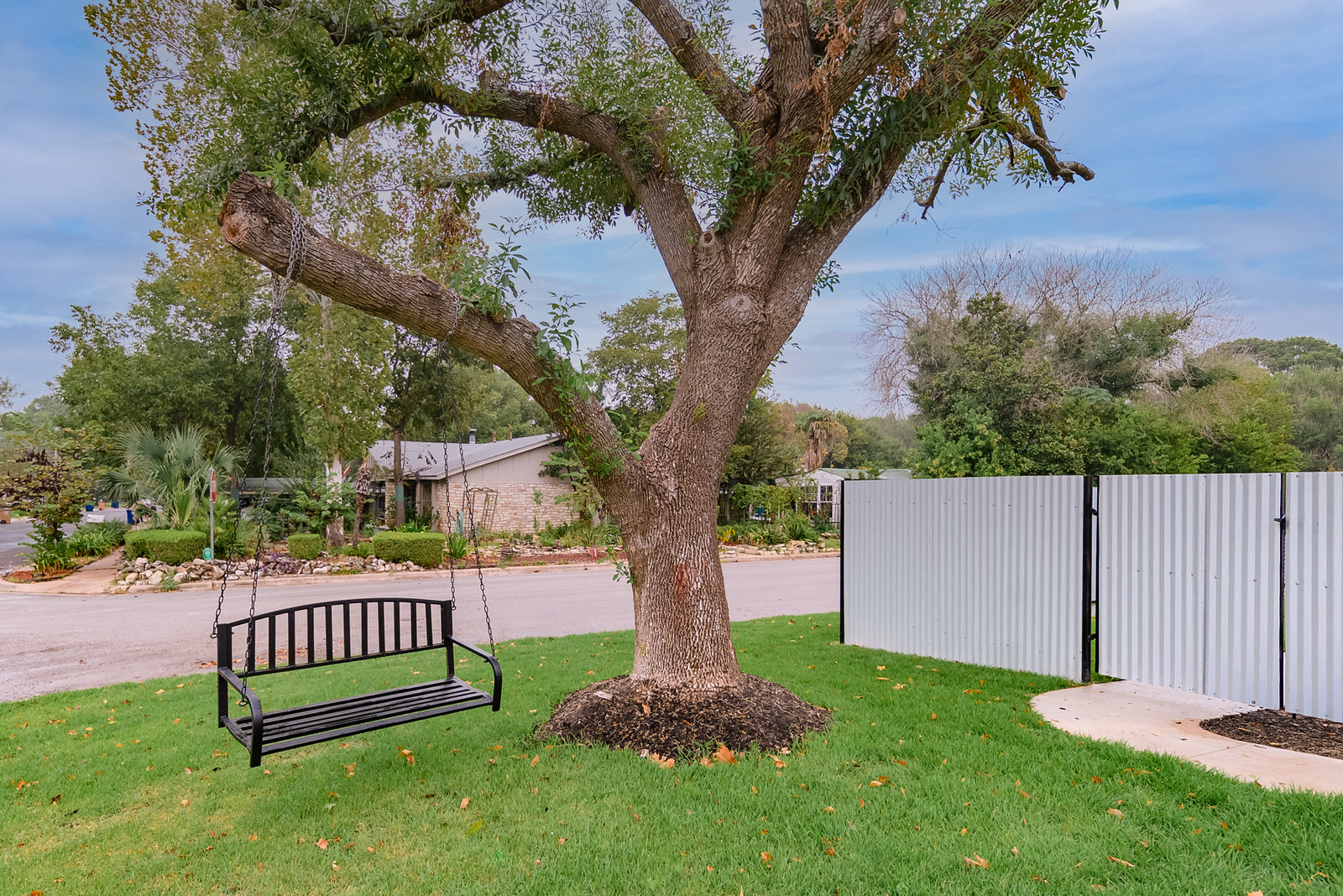 1651 Chippeway Lane Austin, TX 78745 - Photo 24 of 26 a view of a house with a yard and large trees
