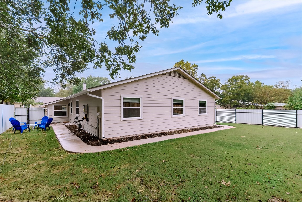 1651 Chippeway Lane Austin, TX 78745 - Photo 25 of 26 a view of a house with a yard