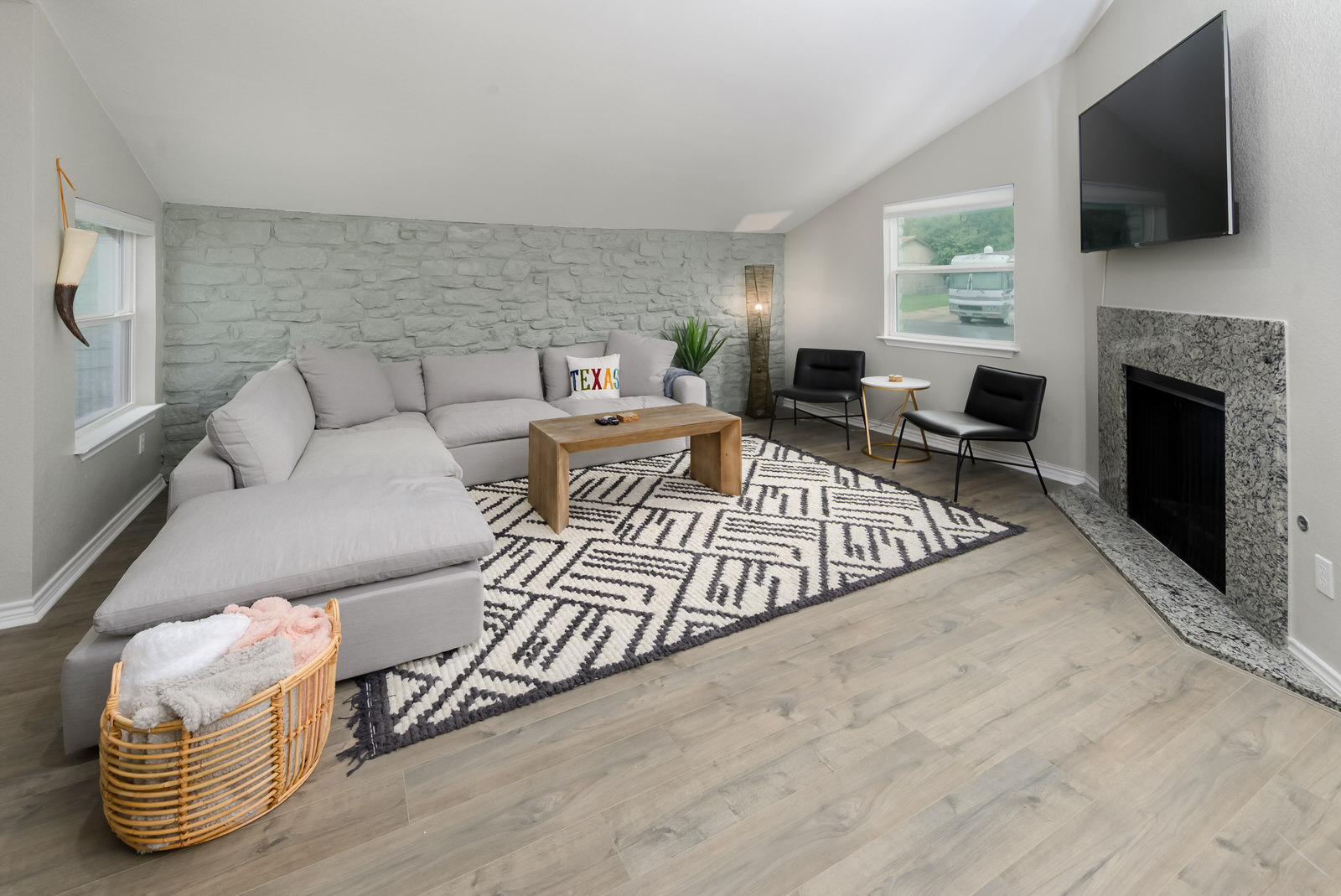 1651 Chippeway Lane Austin, TX 78745 - Photo 7 of 26 a living room with furniture fireplace and flat screen tv