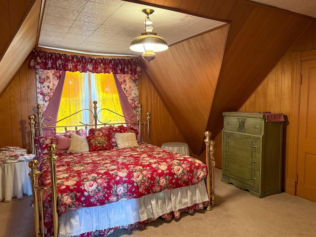 641 West 2nd Street Baird, TX 79504 - Photo 15 of 15 a bedroom with a bed and a window