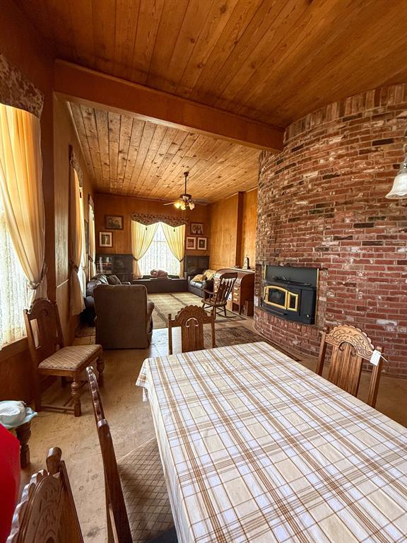 641 West 2nd Street Baird, TX 79504 - Photo 6 of 15 a large bedroom with a bed and wooden floor