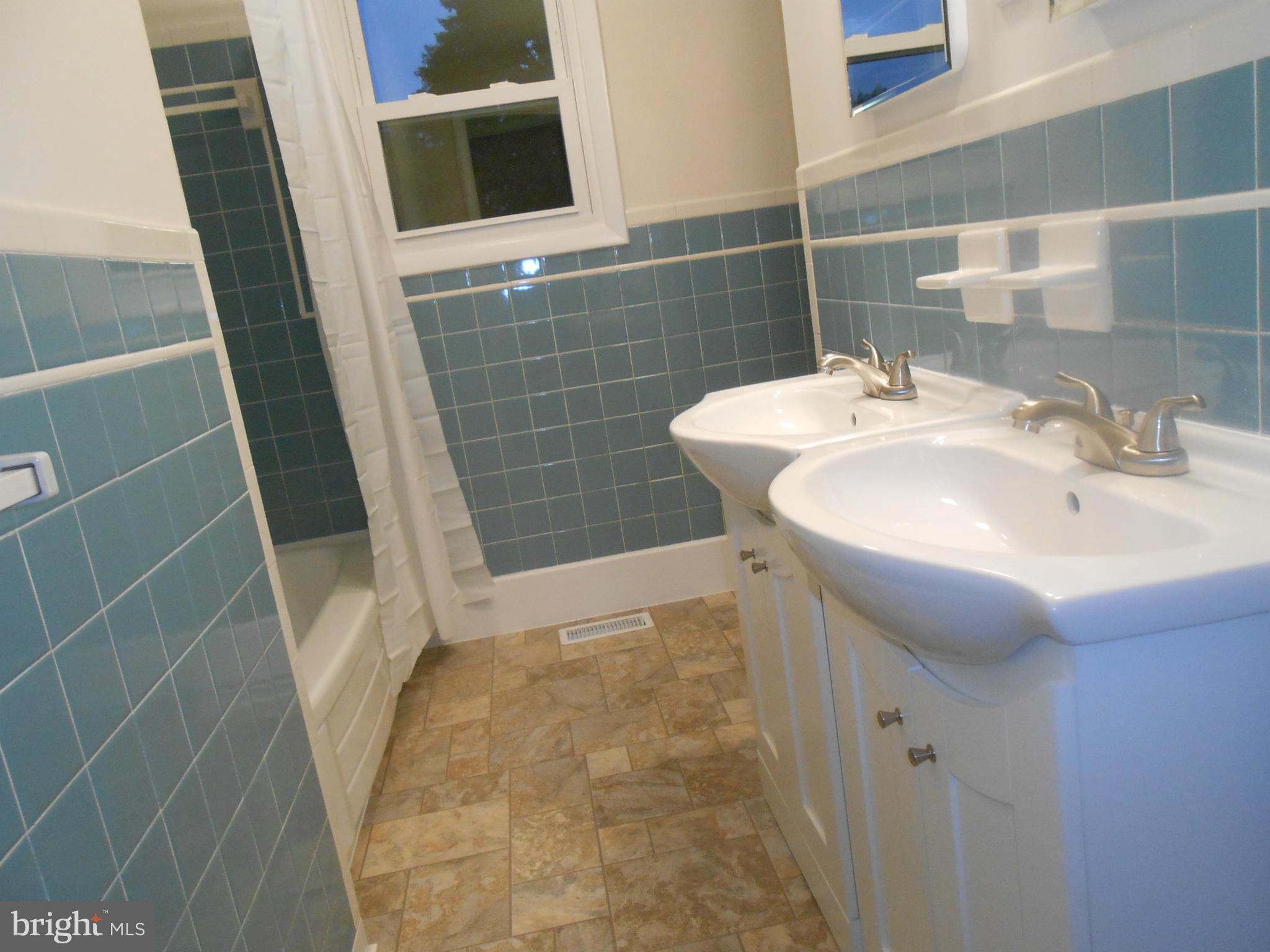 6212 Appletown Road Boonsboro, MD 21713 - Photo 9 of 19 Bathroom has new floors, vanities,floors, lights