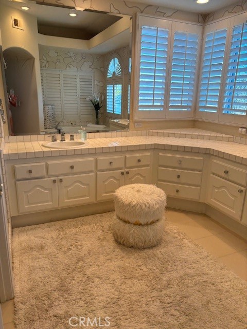 30932 La Mer Laguna Niguel, CA 92677 - Photo 7 of 7 a bathroom with a sink and a mirror